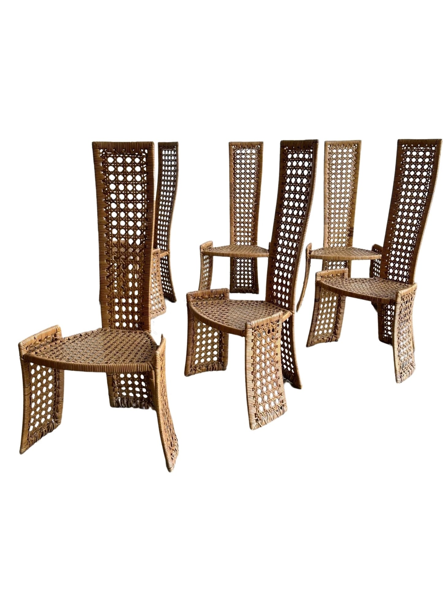 Set of five wicker chairs on a white background