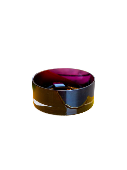 Minimalist product photo of purple Murano glass bowl on white background