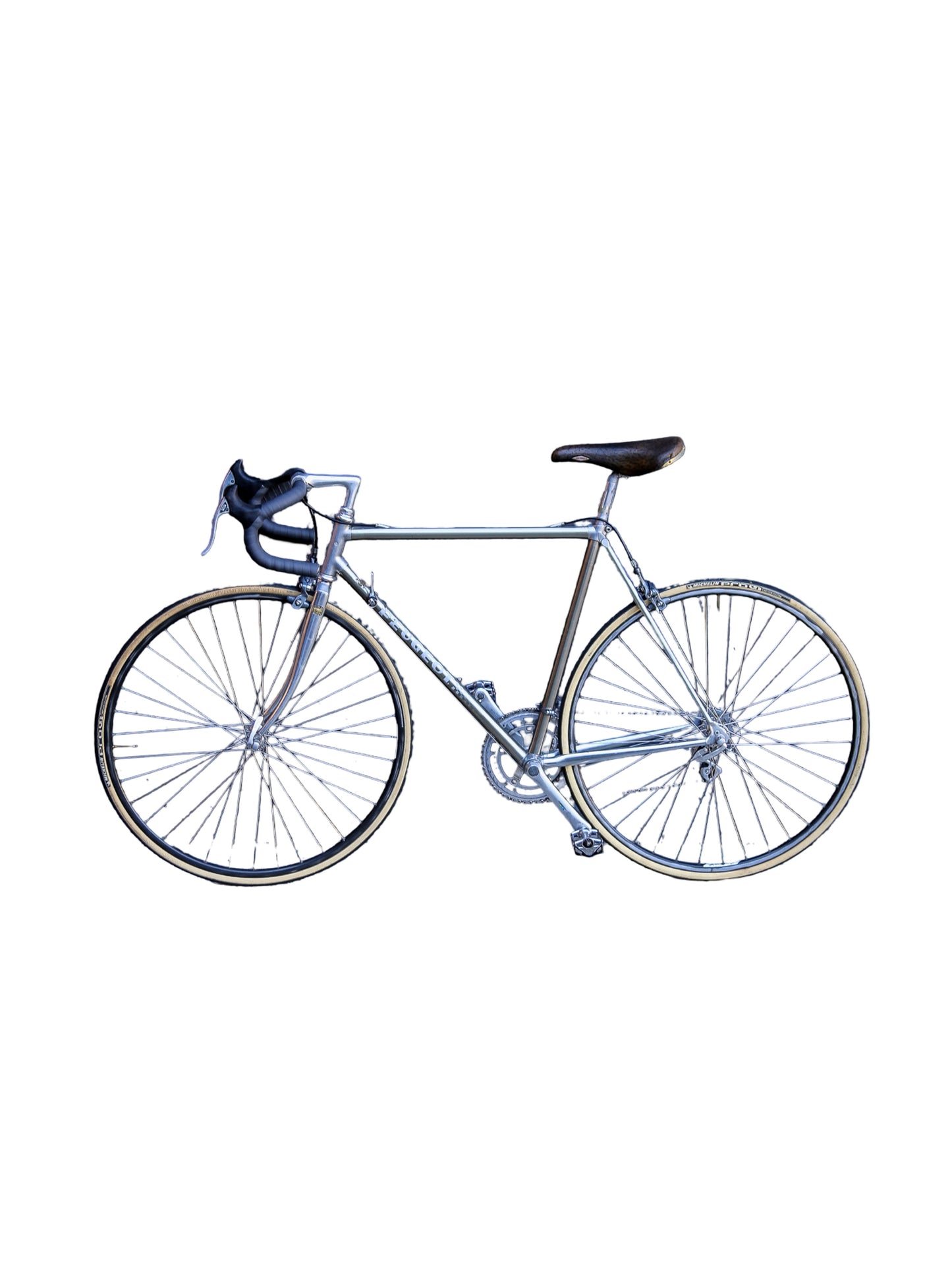 A vintage-style road bicycle with a metallic silver frame, black saddle, and black handlebar tape, shown from the side against a plain white background.