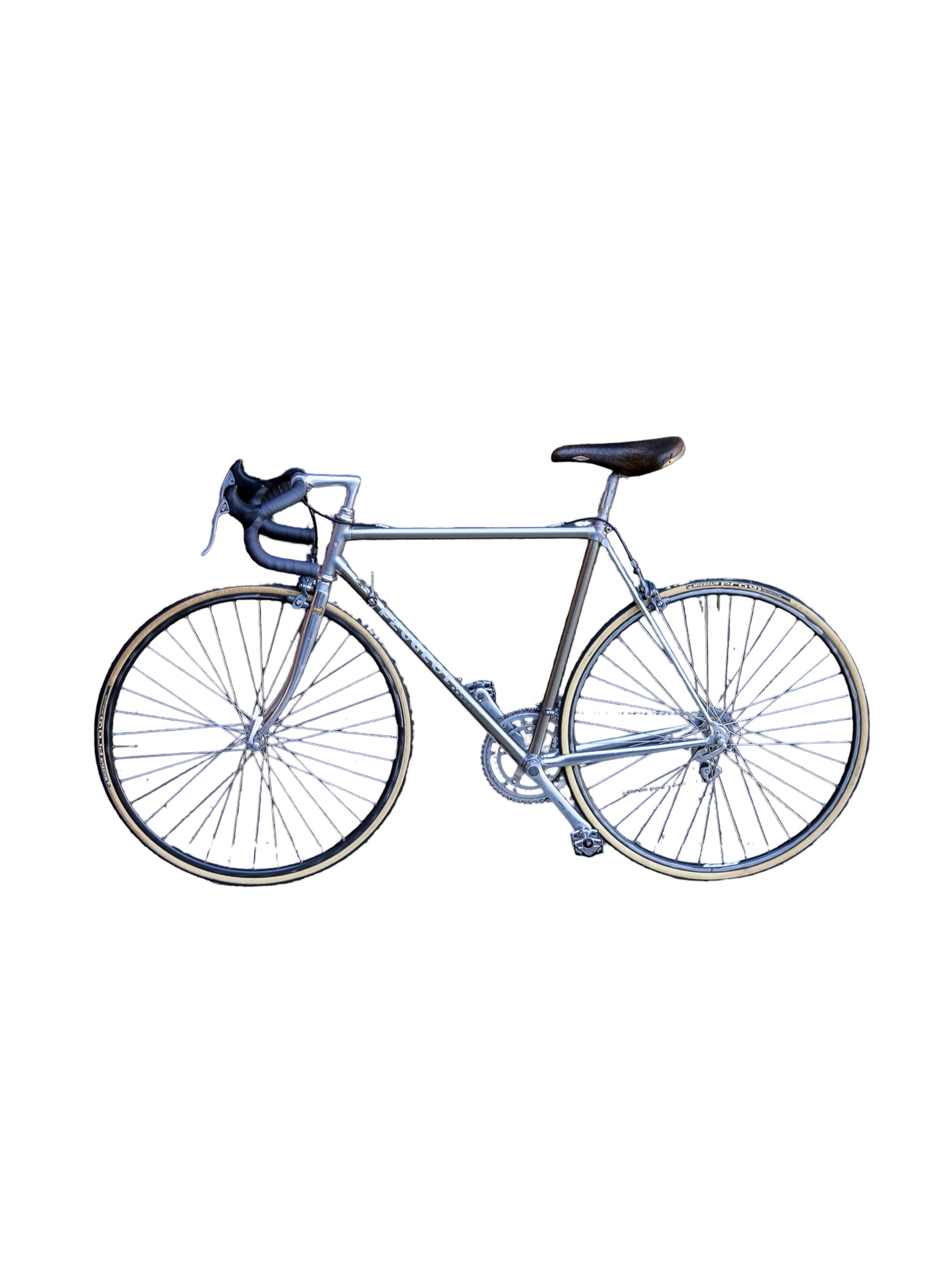 A vintage-style road bicycle with a metallic silver frame, black saddle, and black handlebar tape, shown from the side against a plain white background.