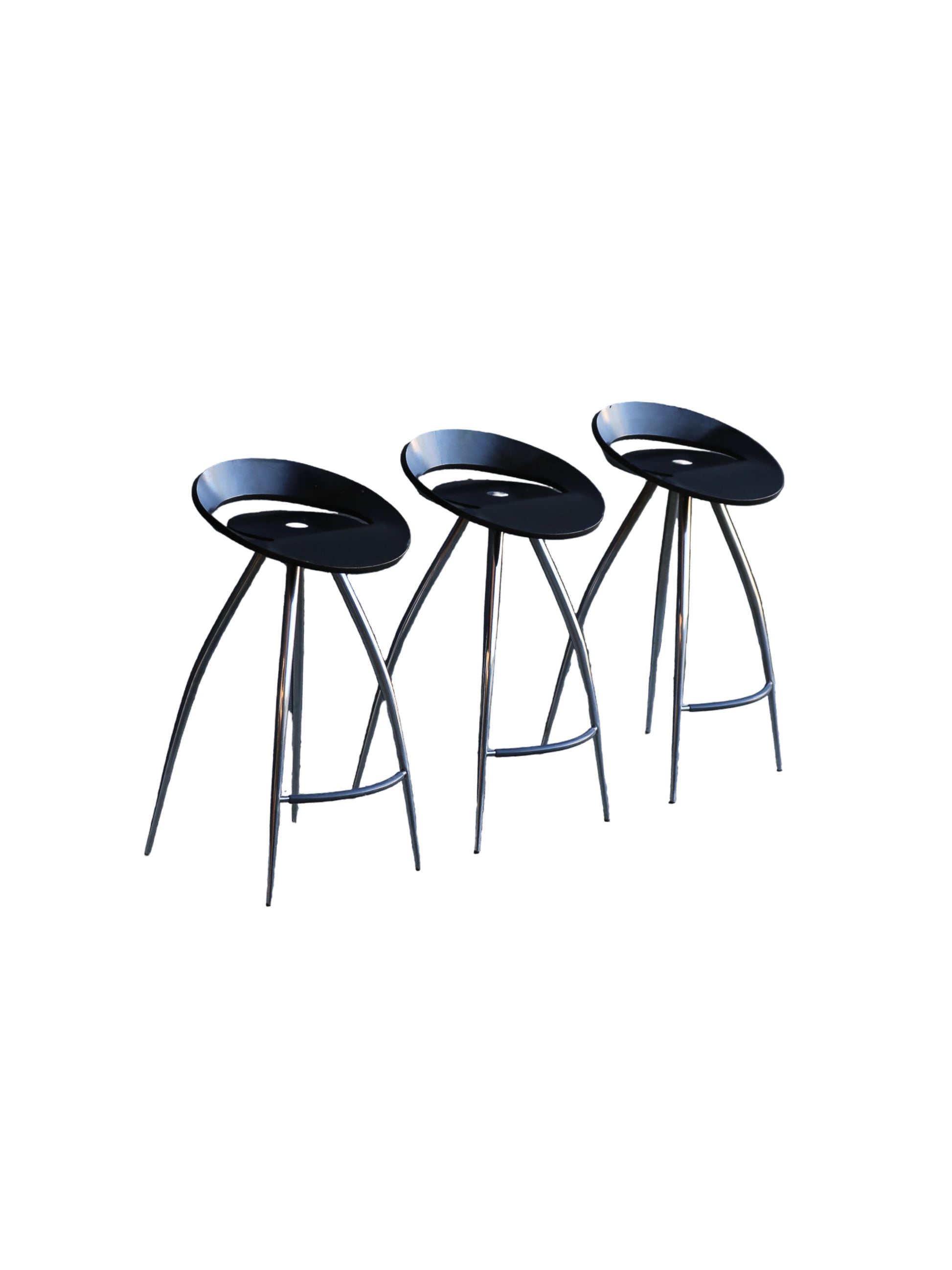 Three black bar stools with metal legs on a white background