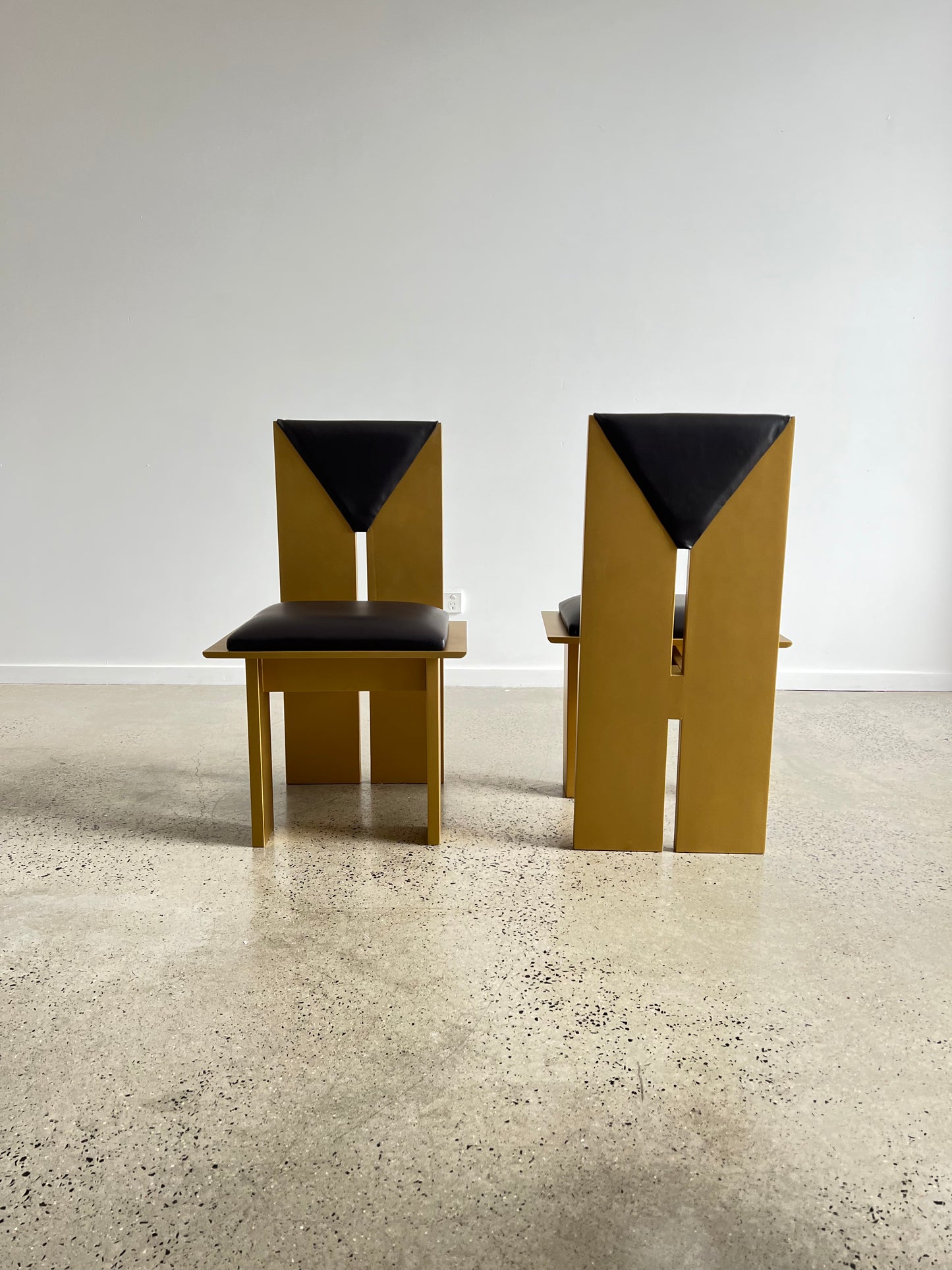 Italian Dining Chairs Art Deco, Pair of two in Gold Laquared Wood and Black Leather, 1980s
