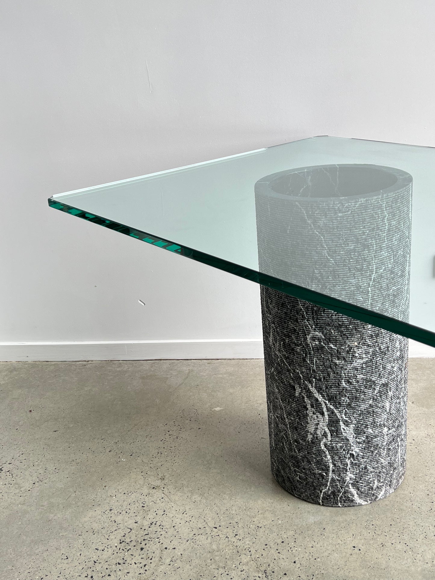marble columns and glass top 